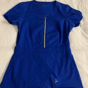 Jaanuu peplum royal blue scrub top. Size small